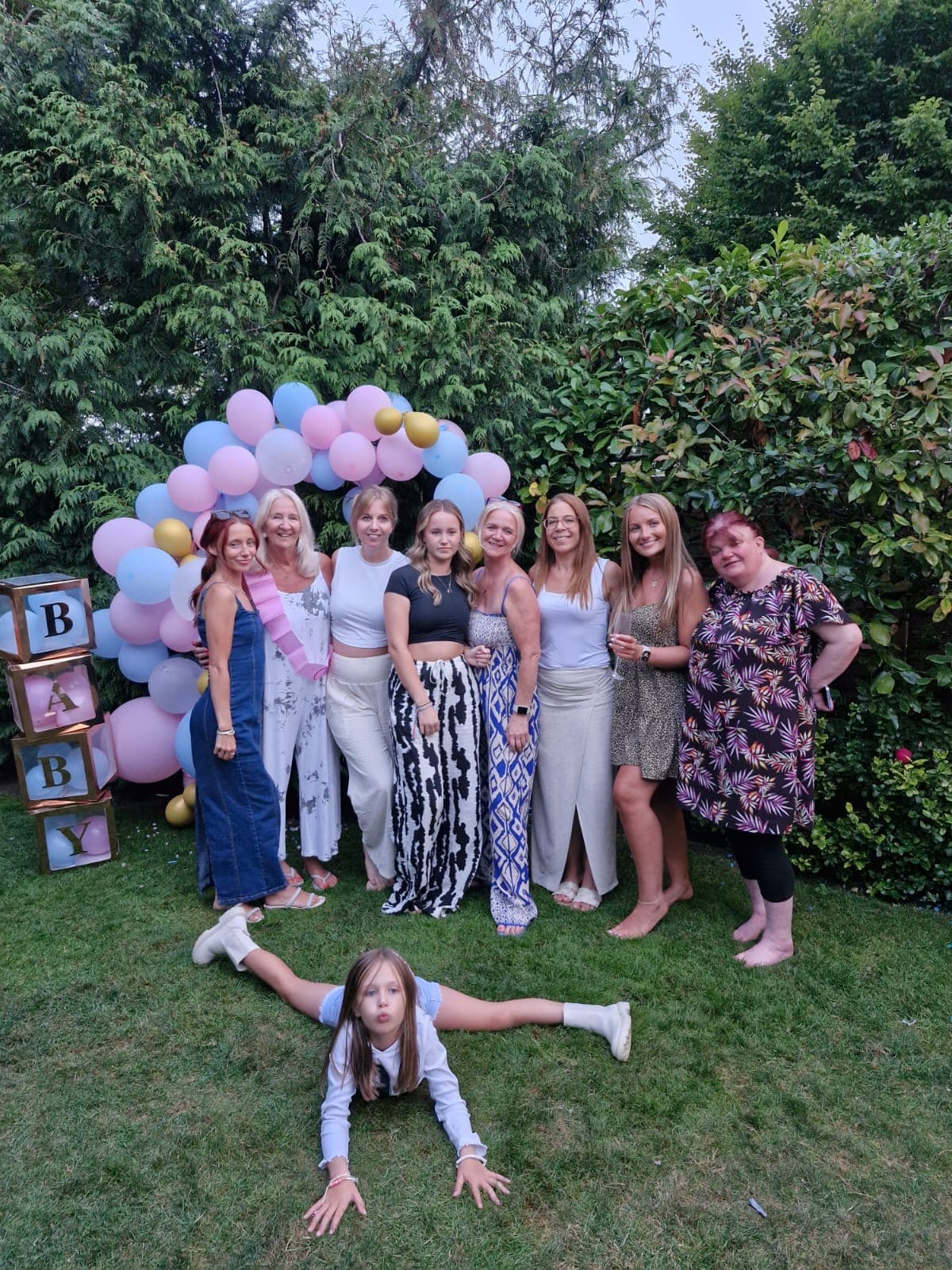 Leila with friends and family at the baby shower
