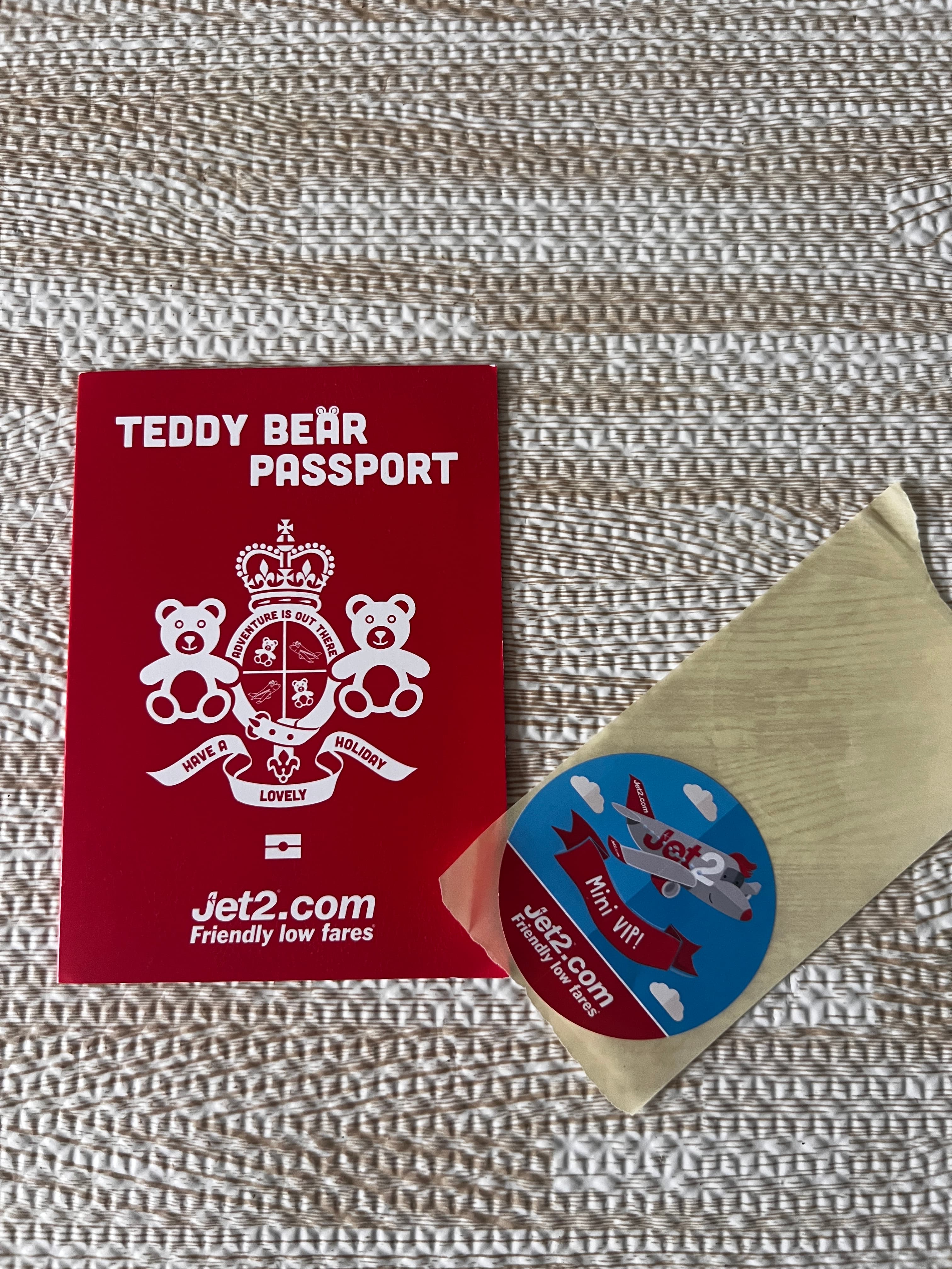 Jet2 teddy bear passport and Mini VIP sticker given to Tallulah on her first flight at 4 months old
