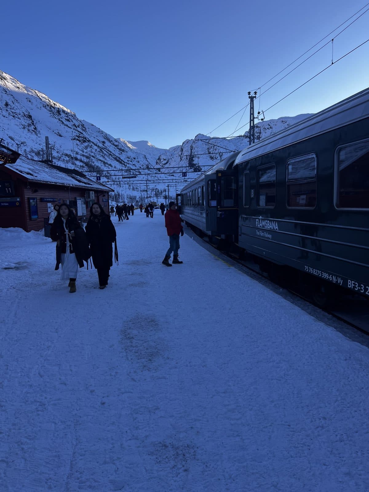 Flamsbana train at a snowy station in Voss Norway during winter